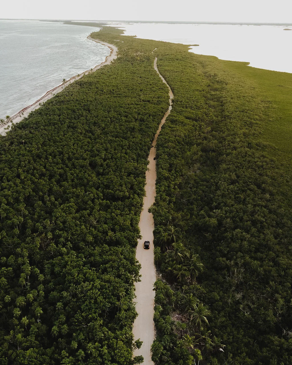 Be Tulum — Coastal road — drone