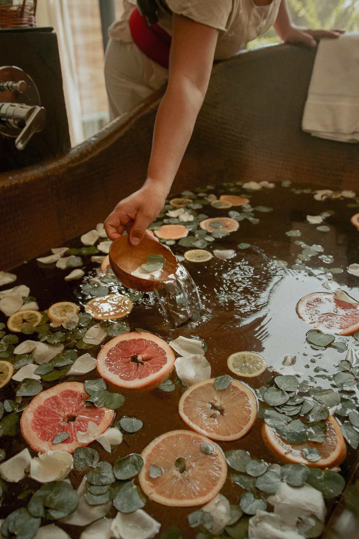 Yäan Healing Sanctuary — Botanical bath preparation